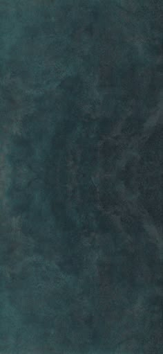 an image of a dark green background that looks like marble