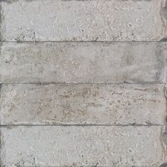 an image of a stone wall that looks like it is made out of cement or concrete blocks