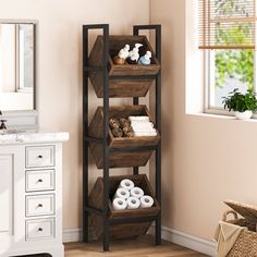 the bathroom is decorated in neutral colors and features wooden shelving units with white towels on them