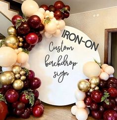 balloons are arranged around a sign that says iron - on custom backdrops, san francisco