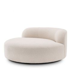 the circular chair is white and has black legs