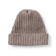 a brown knitted hat on a white background