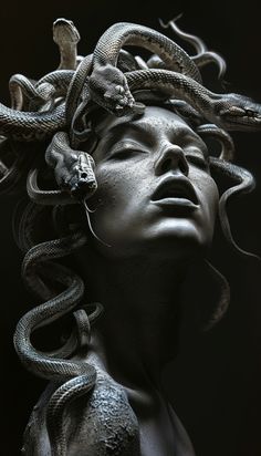 a woman with snakes on her head is shown in this black and white photo,