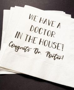 we have a doctor in the house napkins on top of each other with words printed on them