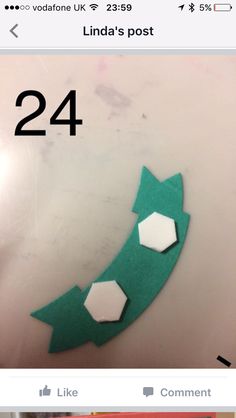 an image of someone making something out of paper with the number twenty four on it