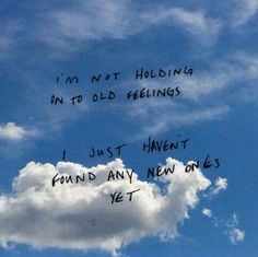 the sky is filled with clouds and some writing on it that says, i'm not holding in to old feelings