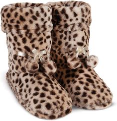 Our Winter Fuzzy Pom Pom Bootie Slippers offer cozy comfort for cold winter mornings. They are made of a soft and plush material, keeping your feet warm and toasty. The fuzzy pom poms add a playful and stylish touch to any outfit. A perfect choice for days spent lounging around the house! Imported Polyester sole Cozy Bootie-Style Slippers - Our Pull-On bootie-style slippers are a longtime customer favorite! Featuring non-skid soles, these 100% Polyester slippers pair perfectly with your favorite Cozy Faux Fur Slippers With Round Toe, Cozy Faux Fur Winter Slippers, Kanken Classic, Celebrity Closets, Bootie Slippers, Slippers Boots, Winter Knit Hats, Soft Slippers, Winter Light