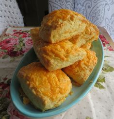 three biscuits stacked on top of each other on a blue plate