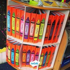 there are many books that are on this bookcase and it is very colorful in color