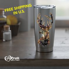 a stainless steel tumbler with an image of a deer on it and the words free shipping in u s