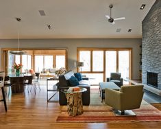 a living room filled with furniture and a fire place