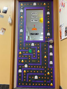 a door decorated to look like a pacman game