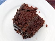 a piece of chocolate cake on a white plate