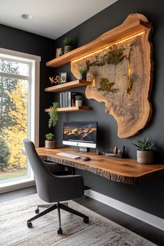 a desk with a computer on top of it in front of a large wooden shelf