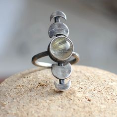 US 6.0 - ready to ship  Here is a MOON PHASE ring created in my home studio with sterling silver and rutilated quartz stone. Do you feel a connection with moon phases? Or wish to remember about the infinite relation of your femininity and the universe? This ring is my brand new design dedicated to all women in the world.  All of my jewelry is created in my home studio. Handmade with love ♥ 100% sterling silver. Styled to old silver.