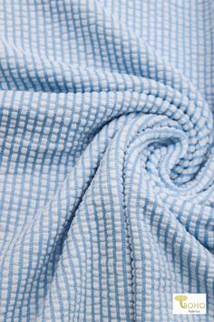 Stay cool and comfortable with our Light Blue Seersucker Knit Fabric. This cotton/spandex blend offers excellent stretch and a classic seersucker texture, perfect for summer dresses, shirts, and casualwear. Seersucker Shirt, Fibres Textiles, Stay Cool, Blue Fabric, Cotton Spandex, Knitted Fabric, Knit Fabric, Casual Wear, Light Blue