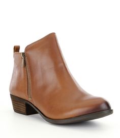 From Lucky Brand&#x2C; the Basel booties feature:Smooth leather upperSide zip entry for easy on/offSynthetic lining and sockRubber outsoleApprox. 1.2" stacked heelImported. Womens Black Booties, Lucky Stone, Lv Handbags, Shoes Collection, Fall Shoes, Dark Brown Leather, Brand Shoes, Basel, Dillard's