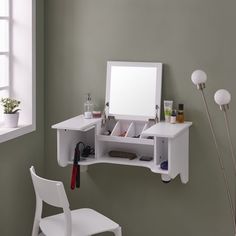 a white desk with a mirror on it