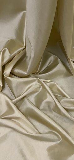 Our Premium Taffeta is the Rolls-Royce of fabric. Taffeta was first produced in the Middle East in the twelfth century, and the word taffeta comes from the Persian word "taftah" meaning "crisp, woven." This luxury material has a strong quality and is lightweight. Taffeta fabric is crisp and holds it shape well as a result of the twisted yarns woven together in a plain weave fashion. There are plenty of colours to choose from, with some even having a two tone effect. Perfect for all types of dres Taffeta Fabric, Royal Blue And Gold, Brocade Fabric, The Middle East, Royce, Rolls Royce, Middle East, Dressmaking, Persian