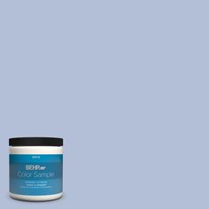 the behr paint color sample is shown in light blue, and it has a black lid