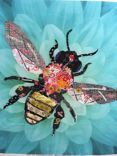 a painting of a bee with flowers on it's back end and wings in the middle