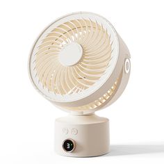 an electric fan sitting on top of a white table