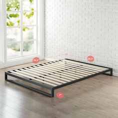 a bed frame is shown with measurements for the mattress