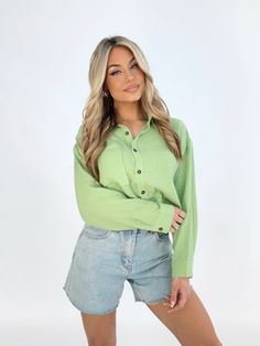 Introducing our bold and bright lime button down shirt. Designed with a collared neckline, button closures, and pocket details - this shirt is perfect for spring and summer. The trendy cropped length adds an elevated and chic touch to any casual brunch date or dinner and drinks outing. Made from soft, stretchy, and lightweight fabric for ultimate comfort. Shell 100% Cotton Hand wash cold. Trendy Spring Shirt For Day Out, Trendy Collared Shirt For Spring, Trendy Collared Blouse For Spring, Trendy Summer Blouse With Collared Neckline, Green Everyday Shirt With Buttons, Trendy Green Shirt With Pockets, Spring Casual Shirt With Collared Neckline, Trendy Relaxed Fit Collared Blouse, Trendy Relaxed Fit Collared Neckline Blouse