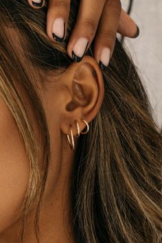 14k Gold-Filled Endless Hoop Earring Collection. Must-have delicate hoop earrings with minimal post tube closure. Set to accompany you all day + all night in pure comfort. Sold separately for you to create your own unique, every-day cascading ear stack. ✦ 14k Gold-Filled ✦ Small - 9mm / Medium - 12mm / Large - 16mm *Sold as a single earring* This item is FINAL SALE Instructions: To open- gently pull apart then gently twist to one side to create an opening to pierce your ear. Do not pull too far Womens Ear Piercings Ideas, Womens Ear Piercings, Piercing Party, Ear Piercings Ideas, Ear Stacking, Piercings Ideas, Gold Hoop Earring, Small Gold Hoop Earrings, Cute Ear Piercings