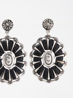 Expertly crafted with a Western-inspired design, these Concho Drop Earrings by Bowie are a sophisticated and versatile addition to any jewelry collection. Adorned with intricate wrapped details, they provide a polished touch to any outfit. Elevate your style with these unique earrings. SizeHEIGHT: 2"WIDTH: 1.25" QualityMade with premium materials for quality and endurance Imported E9520 Concho Drop Earrings, Elegant Silver Concho Earrings, Silver Concho Metal Jewelry, Concho Dangle Earrings For Gift, Elegant Concho Earrings For Gift, Silver Concho Drop Earrings, Elegant Black Concho Jewelry, Elevate Your Style, Unique Earrings