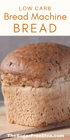 a loaf of bread sitting on top of a wooden cutting board with the words low carb bread machine bread