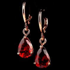 Stunning Simulated Ruby Gemstone Tear Drop Earrings. Made With Gold Tone Stainless Steel. **I Love Offers And Providing Bundle Deals!** New To Posh? Sign Up W/ Code Moonrisethrift For $10 Off Any Purchase! :) Gothic, Edgy, Witch, Witchy, Girly, Classic, Minimalist, Feminine, Hot Topic, Brandy Melville, Madewell, Anthropologie, Urban Outfitters, Gift, Boho, '90s, Y2k, Retro, Vintage Ruby Earrings Aesthetic, Evil Aesthetic, 90s Earrings, Seashell Earrings, Tear Drop Earrings, Y2k Retro, Cz Stud Earrings, Beaded Dangle Earrings, Ruby Gemstone