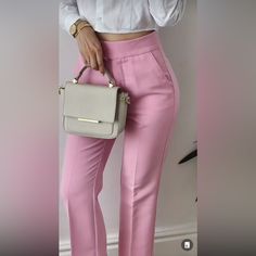 Zara New With Tags Ankle Pants Pink High-Waisted Pants With Side Pockets And Back False Welt Pockets. Front Zip, Metal Hook, And Interior Button Closure. Color Pink Outer Shell 55% Cotton 42% Polyester 3% Elastane Blogger's Favorite Already Sold Out At Store And Online. All Sales Are Final. No Returns. Please Ask All Questions Before Purchasing. Thank You For Looking Trendy High Waist Wide Leg Office Pants, Trendy Ankle-length Workwear Pants, Spring Stretch Bottoms For Office, Trendy Bottoms For Spring Workwear, Trendy Spring Bottoms For Workwear, Trendy Spring Workwear Bottoms, Trendy High-waisted Dress Pants For Office, High Waist Spring Bottoms For Office, Trendy Ankle-length Dress Pants For Work