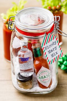 a glass jar filled with different types of condiments