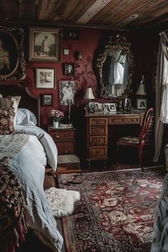 a bedroom with red walls and antique furniture