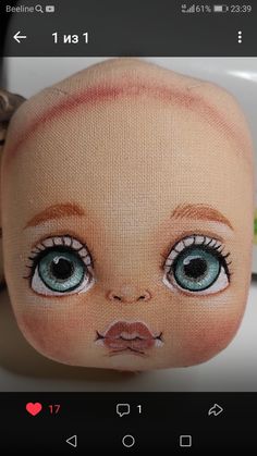 an image of a doll with big blue eyes on it's head and eyebrows