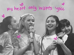 three girls singing into a microphone with the words my heart only wants you