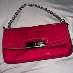 Nwot Coach Magenta Color Small Handbag With Pink Lining And Silver Chain And Accents Size Small Ti Medium Has Coach Keychain So Cute Smoke Free Home Chic Clutch With Branded Hardware, Trendy Pink Bag With Silver-tone Hardware, Daily Use Clutch With Silver-tone Hardware, Silver-tone Hardware Clutch For Daily Use, Elegant Pink Coach Clutch, Coach Pink Bags With Silver-tone Hardware, Classic Pink Bag With Magnetic Closure, Designer Pink Bag With Magnetic Closure, Trendy Coach Clutch Bag