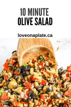 a wooden spoon full of olive salad with the title above it that reads 10 minute olive salad