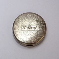 a close up of a pocket watch on a white surface with the words, usa passport