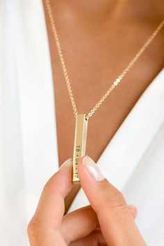 This stylish necklace with it's free moving square bar pendant can be personalized to create a treasured and special gift for a loved one. The bar can be engraved with your special message, a name, or date which the recipient can choose to wear with the message showing or turn the slider to keep it secret. #necklace #personalizednecklace #customnecklace #goldnecklace #silvernecklace #womensnecklace #barnecklace Affordable Customized Stainless Steel Necklaces, Luxury Elegant Bar Necklace, Luxury Gold Bar Necklace For Everyday, Minimalist Personalized Rectangular Jewelry, Minimalist Rectangular Name Necklace For Gifts, Minimalist Rectangular Name Necklace As Gift, Personalized Rectangular Jewelry For Best Friend Gift, Minimalist Custom Name Rectangular Jewelry, Engraved Rectangular Jewelry For Best Friend