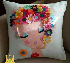 a decorative pillow with flowers on it