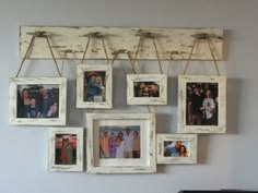 a group of framed pictures hanging on a wall