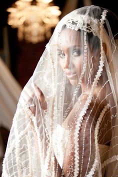 a woman in a wedding dress and veil