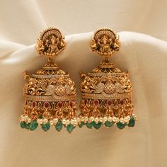 Show off India's culture and tradition by wearing perfectly handcrafted temple jewellery jhumkas! Explore our temple jewellery collection! Latest Design Earrings Gold, Gold Wedding Earrings Indian, Lakshmi Jhumkas Gold, Gold Antique Jhumkas, Lakshmi Buttalu Earrings Gold, Cz Earrings Indian Gold, Temple Jewellery Earrings Antique, Jumka Earrings Gold Indian Jewelry