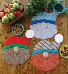 the table is covered with various items to make it look like gnomes and apples