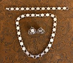 "Vintage Sarah Coventry Jewelry Set            739 15.25\" necklace 7.25\" bracelet 1\" in diameter earrings Lovely silver tone connecting link style. All pieces are marked: SARAH COV or SAC $80.00 Please note: Vintage in my shop means-Sold \"As Is\". Vintage implies \"previously worn\" and may need repair or cleaning. All sales final. Enjoy All sales final!" Lisner Jewelry Vintage, Sara Coventry Jewelry Vintage, Silver Hallmarked Jewelry Sets, Sarah Coventry Jewelry, Vintage Jewlery, Vintage Lifestyle, Sarah Coventry, Old Jewelry, Coventry