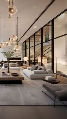 a living room with couches, tables and chandeliers