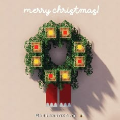 a christmas card with an ornament shaped like a wreath