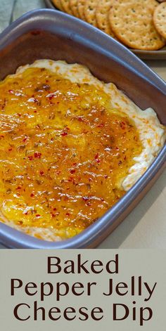 baked pepper jelly cheese dip with crackers in the background